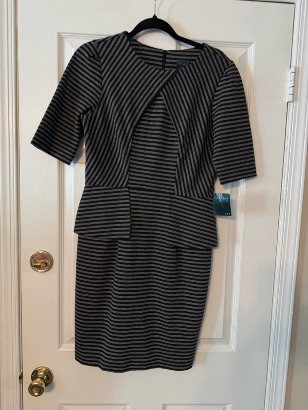 Gabby Skye Black and Gray Striped Peplum Midi Dress